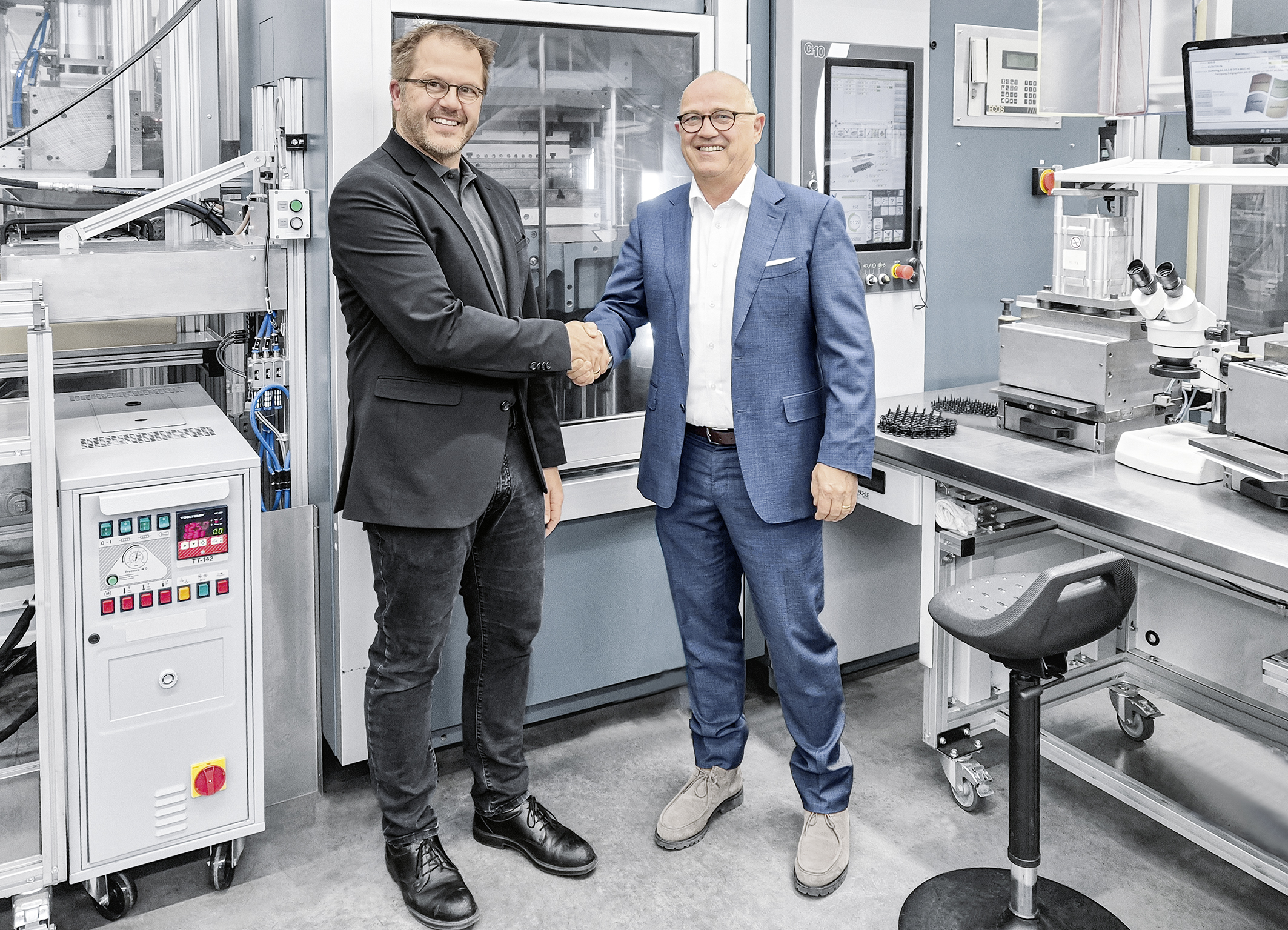 Handshake Festo und Neddermann